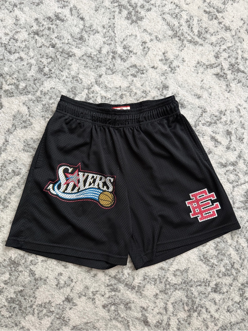 Eric Emanuel Black Sixers Basketball Shorts with Red Logo Accents